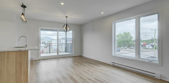 *UNITÉ STYLE CONDO 5 1/2 AU RDJ AVEC 3 GRANDES CHAMBRES RIVE-SUD - Photo 2