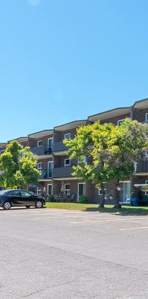 Village Green Apartments - Photo 1