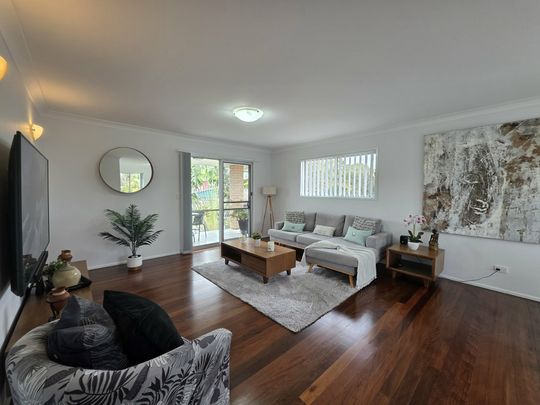 BEACHSIDE COMTEMPORARY LIVING AWAITS IN WOORIM! - Photo 1