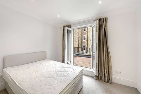 A charming third floor period conversion in a prime South Kensington location, boasting plenty of natural light and a private terrace. - Photo 2