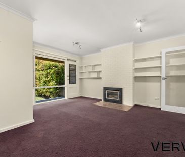 DELIGHTFUL THREE-BEDROOM HOME - Photo 4