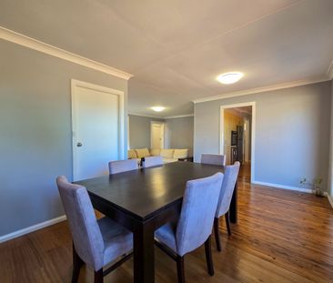 Spacious Family Home with Drive-Through Parking & Outdoor Entertaining - Photo 4