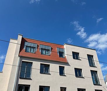 Modernes Wohnen mit Stil: 2 Zimmer Neubau Wohnung mit Balkon, Einbauküche und Stellplatz! - Foto 1