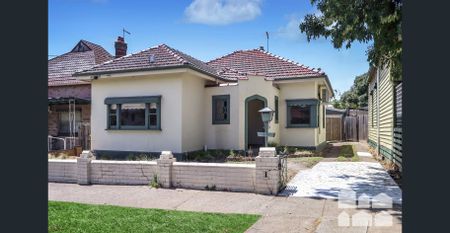 UPDATED HOME WITH DOUBLE GARAGE! - Photo 2