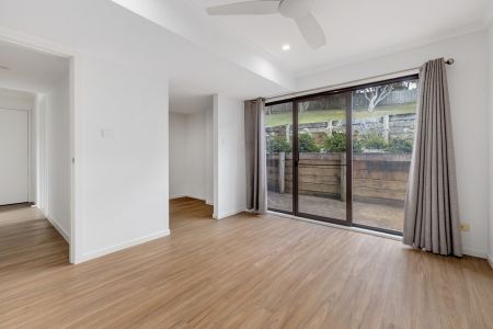 Modern, Light-Filled Family Home with Lawn Mowing Included! - Photo 2