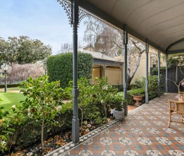 CHARMING VICTORIAN-INSPIRED HOME IN A BRIGHT, LOW MAINTENANCE GARDE... - Photo 2