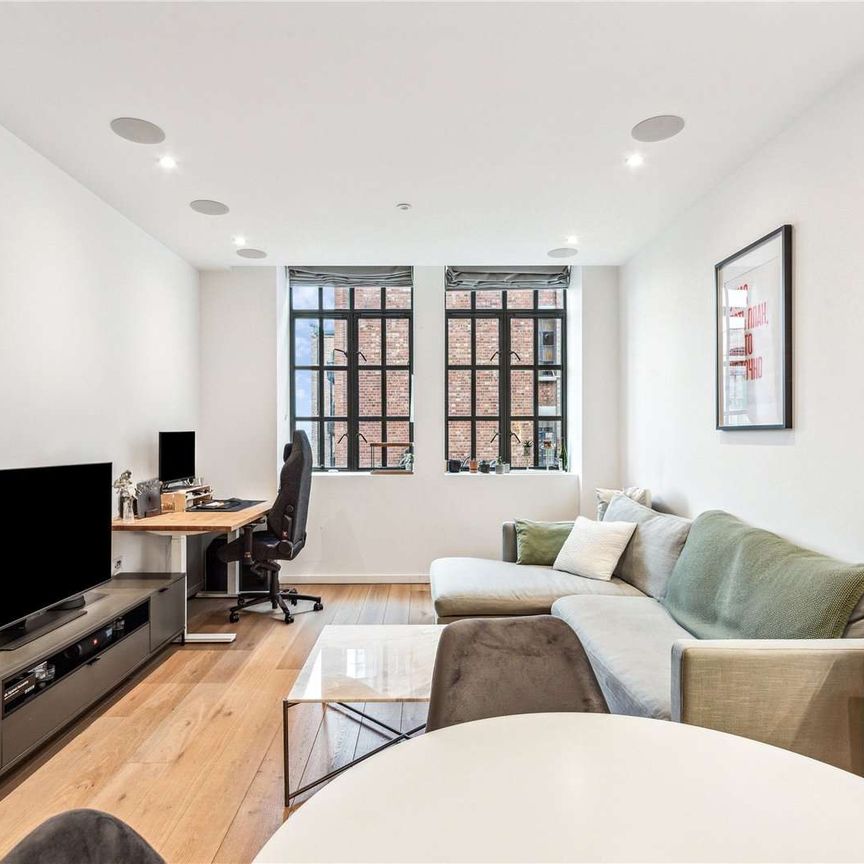 Available for short let and inclusive of all bills & utilities, is this turnkey one bedroom apartment in a sought after, popular development. - Photo 1