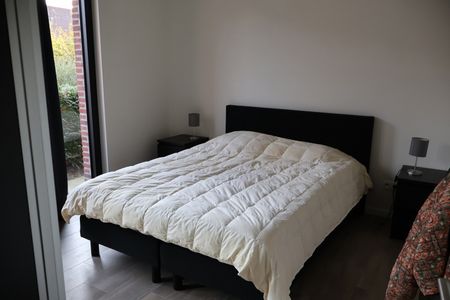 Gelijkvloers appartement met terras, carport en berging. - Photo 3