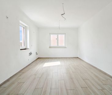 Moderne und großzügige Wohnung mit Einbauküche und Süd-Balkon - Foto 2