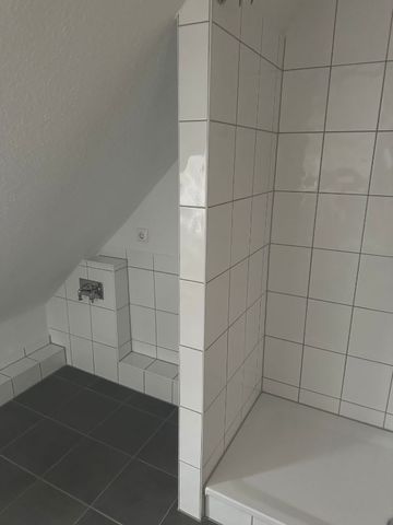 Kleine gemütliche Dachgeschosswohnung im Tribseer! - Foto 3