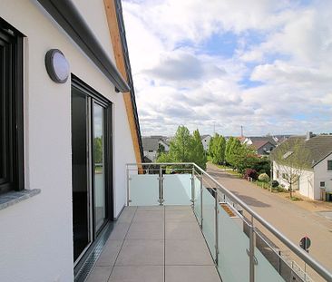 Neubau-Erstbezug 3-Zimmer-Dachgeschosswohnung mit Balkon und PKW-Stellplatz - Foto 3