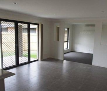 Spacious Family Living in Coomera Grand! - Photo 1