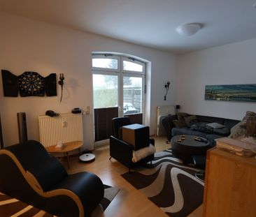 Erdgeschosswohnung mit Terrasse, Stellplatz und Keller - Photo 2