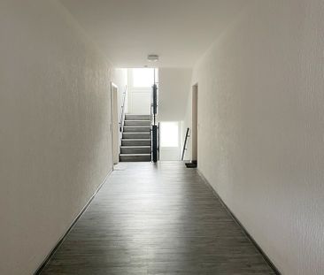 Grüner Blick inklusive: Erdgeschosswohnung mit Südwest-Balkon in ru... - Photo 1