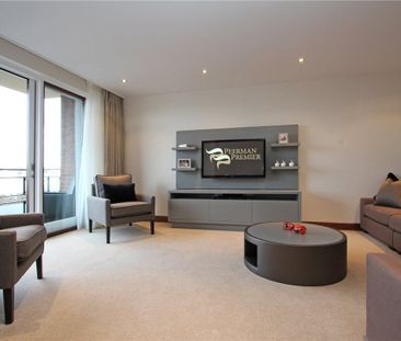 A smart spacious two bedroom flat on the 8th floor of this well run... - Photo 1