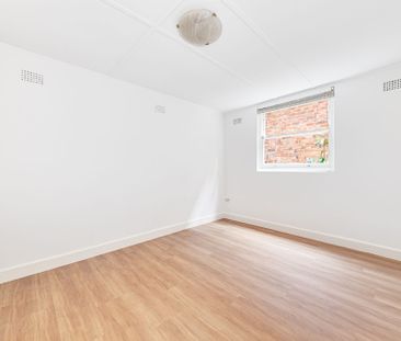 Renovated Two Bedroom Duplex in Convenient Location - Photo 1