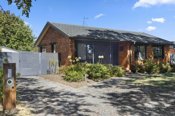 Discover Downer: Where Serene Suburban Living Meets Urban Convenience! - Photo 1