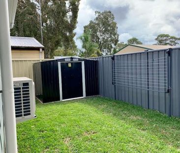 Modern & Secure Two-Bedroom Home in Prime Location - Photo 6