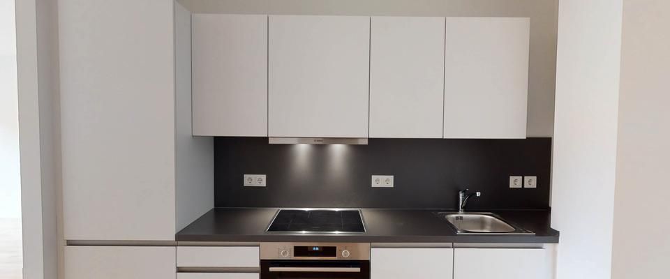Moderne Wohnung mit Einbauküche - Foto 1