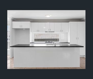 Spacious Family Living Awaits in This Stunning 4-Bedroom Home - Photo 4