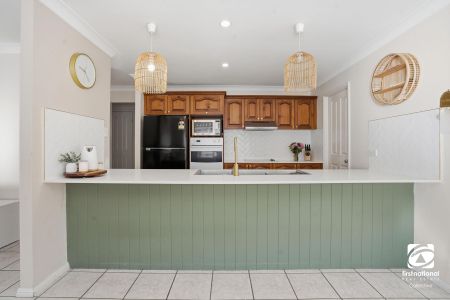 Charming Family Home Opposite Parklands in Sought-After Location - Photo 2