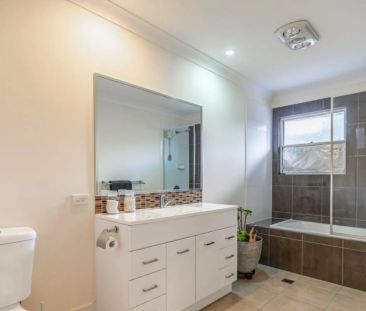 Modern 3-Bedroom Townhouse in Prime Eagleby Location - Photo 2