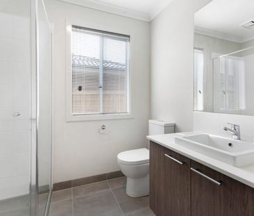 Modern 4-Bedroom Home with Open Plan Living and Large Backyard - Photo 6