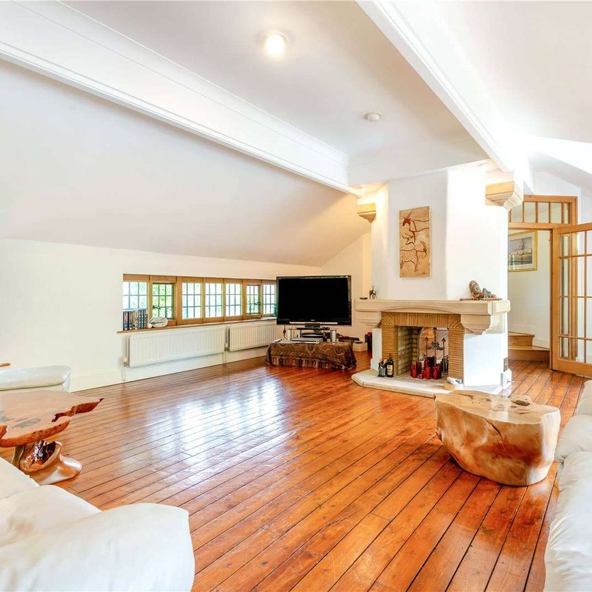 Situated in one of the most sought after roads in Englefield Green, a detached house full of character set in magnificent gardens with swimming pool. - Photo 1