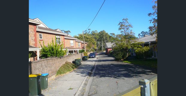 Spacious Unit in Perfect Location! - Photo 1