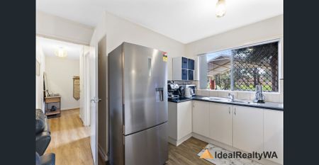 Make this charming home yours—act fast before it’s gone! GREEN TITLED FAMILY HOME IN PRIME LOCATION - Photo 2