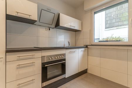 Schöne ca. 66m² große 2-Zimmer-Wohnung mit Balkon, Einbauküche und Tiefgaragenstellplatz in Herdecke - Foto 4