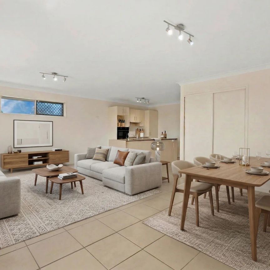 Elevated Family Living with Spacious Deck & Prime Bayside Convenience - Photo 1