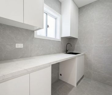 Luxury Meets Location: Brand New Renovated Two-Story Living - Photo 3