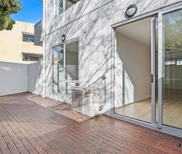 Contemporary Two-Bedroom Apartment In Sought After Location! - Photo 6