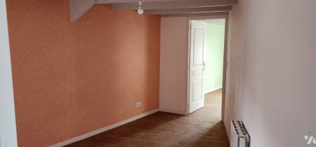 Une maison en plein centre de BRICQUEBEC - Photo 2