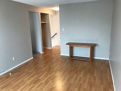 2 Bed Townhouse In Bowness | In Suite Laundry | Parking Included | Utilities Included - Photo 1