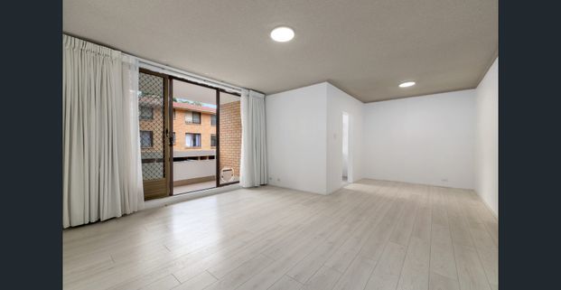 Two-Bedroom Apartment with Carport & Private Laundry - Photo 1