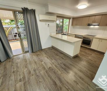 Double Garage, Air-Conditioned and wooden flooring throughout! - Photo 6