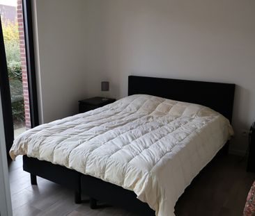 Gelijkvloers appartement met terras, carport en berging. - Photo 3