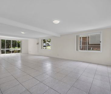 A charming home set on a generous block with a sprawling backyard. - Photo 4