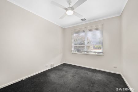 Conveniently positioned modern two bedroom unit with lock up garage - Photo 3