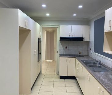 Five-Bedroom Home with Workshop & Double Garage - Photo 6