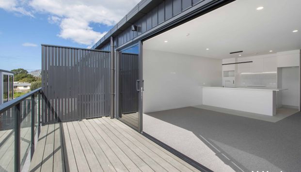 Modern 2-Bedroom Apartments in Prime Village Location - Walk to Beach - Photo 1