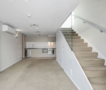 Stylish two-bedroom apartment puts you in the heart of the city - Photo 1