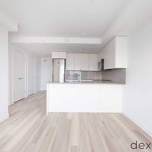 RENT COMMERCIAL DRIVE! BRAND-NEW PET-FRIENDLY 1 BED + DEN APARTMENTS! - Photo 2