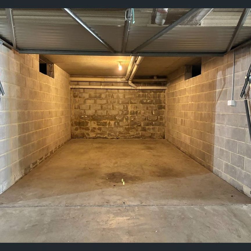 Expansive Top Floor Living With Lock-up Garage - Photo 1