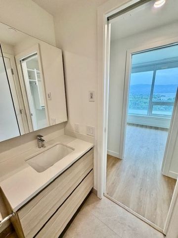 Beautiful 16th Floor Condo – BRAND NEW – WATER BY THE PARK - Photo 2