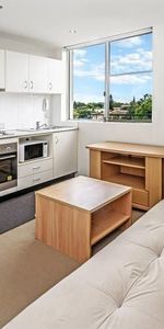 TOP FLOOR NICELY FURNISHED STUDIO WITH A CAR SPACE - Photo 3