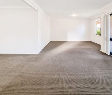 Spacious Brick Family Home with Renovated Kitchen & Entertainer's Rumpus Room - Photo 1