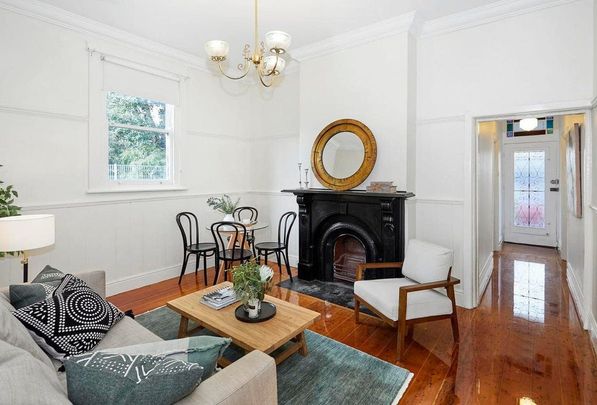 Charming Victorian Cottage with Modern Comforts in Premier Abbotsford Pocket - Photo 1